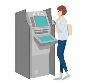 ATMの操作をしている女性
