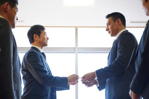 “Here's my card.”