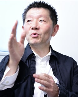 岡田勲 氏