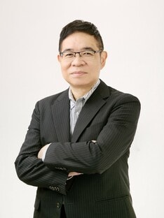 西 俊明