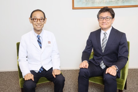 写真左：浦田哲郎理事長 　　右：田村忠司氏