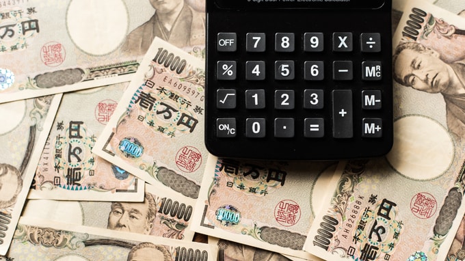 日本国債、見通し引き下げられるも影響は限定的